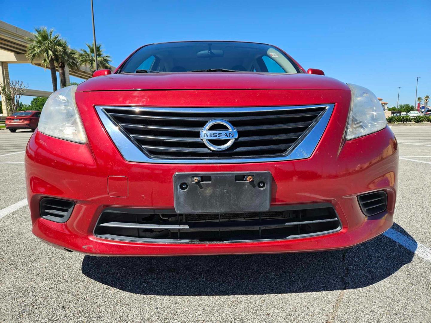 2012 Red /Black Nissan Versa (3N1CN7AP8CL) , located at 5005 Telephone Rd., Houston, TX, 77087, (713) 641-0980, 29.690666, -95.298683 - Photo#2